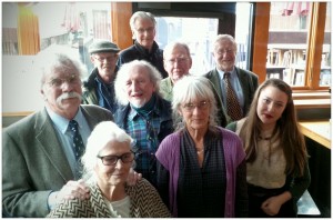 BYRON LINARDOS  MEMORIAL GATHERING Front (l. to r.): Tom Rush Betsy Siggins, Dave Wilson, Carol Langstaff, Elizabeth Butters. Middle: (l. to r.): Spider John Koerner, Jim Rooney, Tom Curran Back: Geoff Muldaur [Photo: Don West]